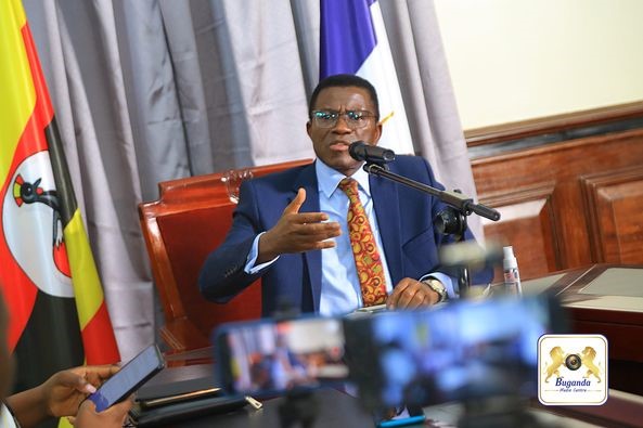The Katikkiro addressing the media Image